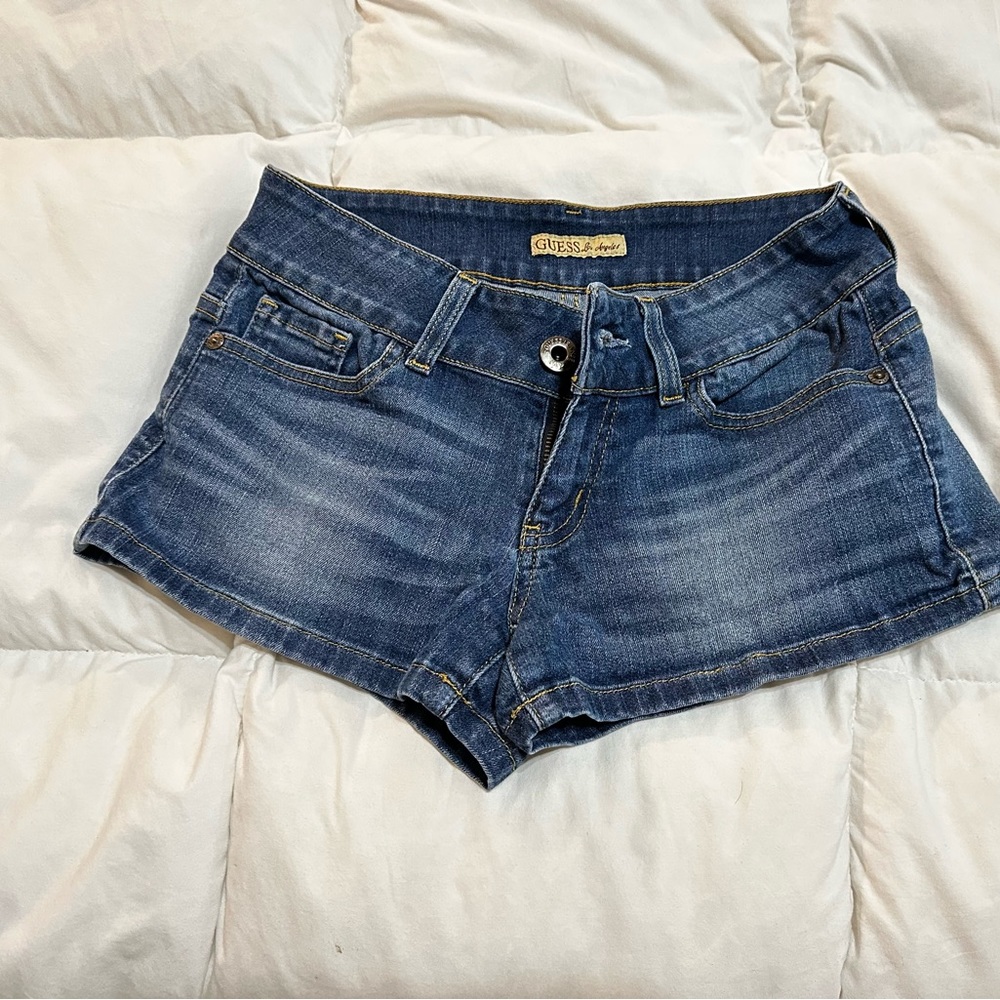 Like new medium wash jean shorts by Guess.